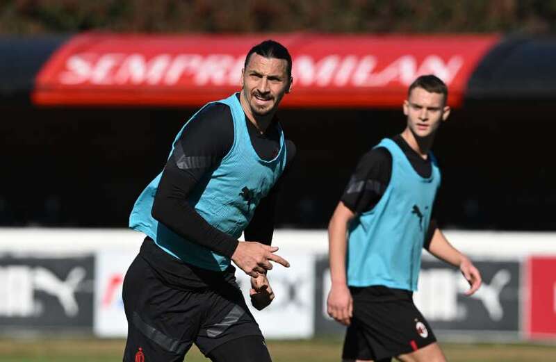 Ibrahimovic plays with son Maximilian as pair train together at AC Milan