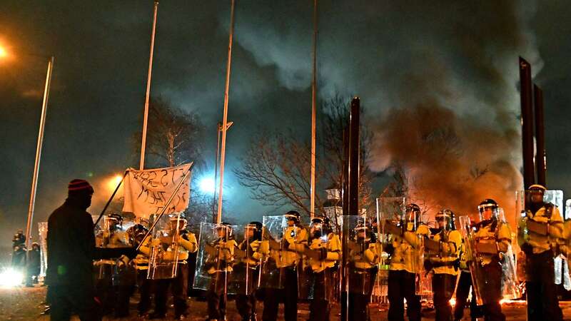 Riot police outside Knowsley Suites Hotel, Kirkby, Liverpool (Image: Liverpool Echo)