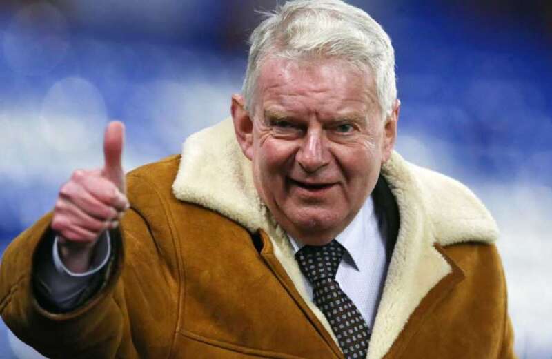 Why did John Motson wear a sheepskin coat?