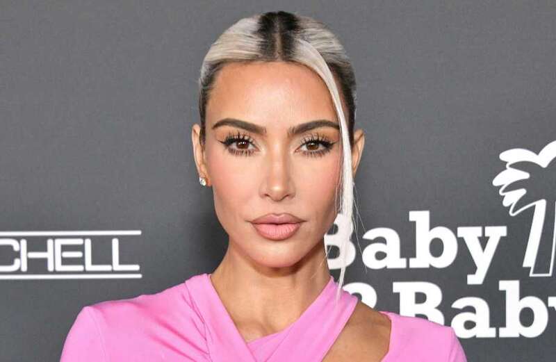 Kim looks unrecognizable with big lips, tiny nose and hair change