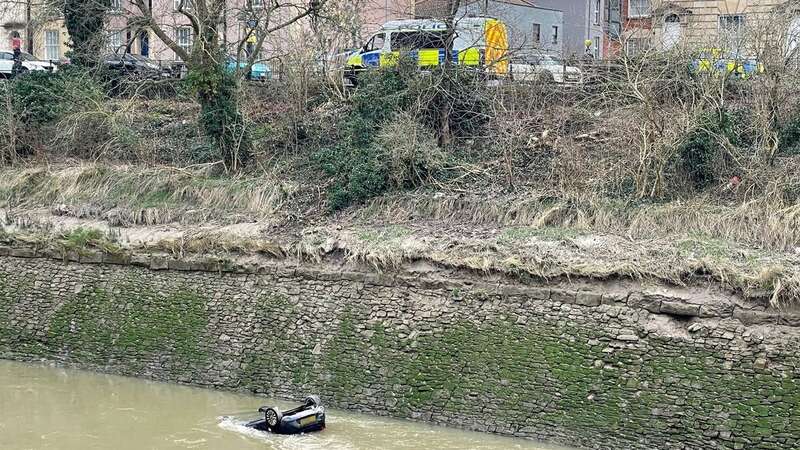 The scene in the Bedminster area of Bristol after a car went through railings and into the River Avon (Image: PA)