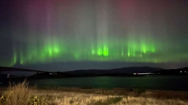 An image of the Northern Lights over Kyleakin on the Isle of Skye (Image: PA)