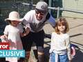 Dad who lost limbs in accident beams as he's able to hold his daughters again