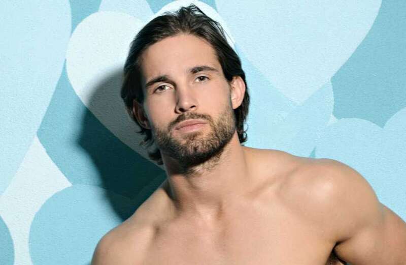 Love Island hunk has shock career change after launching $1million lottery