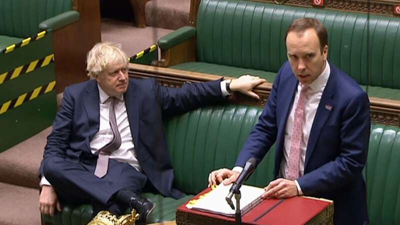 Former Prime Minister Boris Johnson with the then-Health Secretary Matt Hancock giving a Covid-19 update in the House of Commons in November 2020 (Image: PRU/AFP via Getty Images)