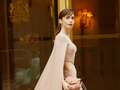 Emily In Paris star Lily Collins, 33, wows in cut-away gown and cape