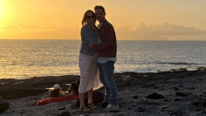 James and Jayne on the beach during their holiday (Image: James Dobson / SWNS)