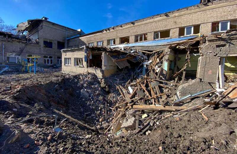 Russian missiles blitz school in Ukraine ripping huge craters in playground