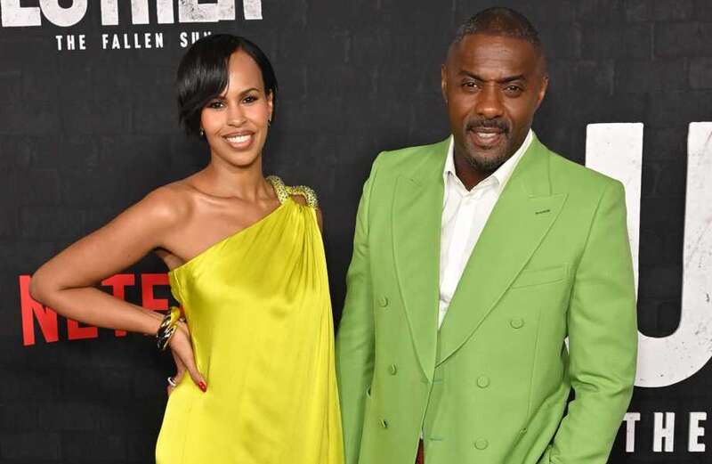 Idris Elba & wife dazzle in bright outfits at Luther: The Fallen Sun premiere