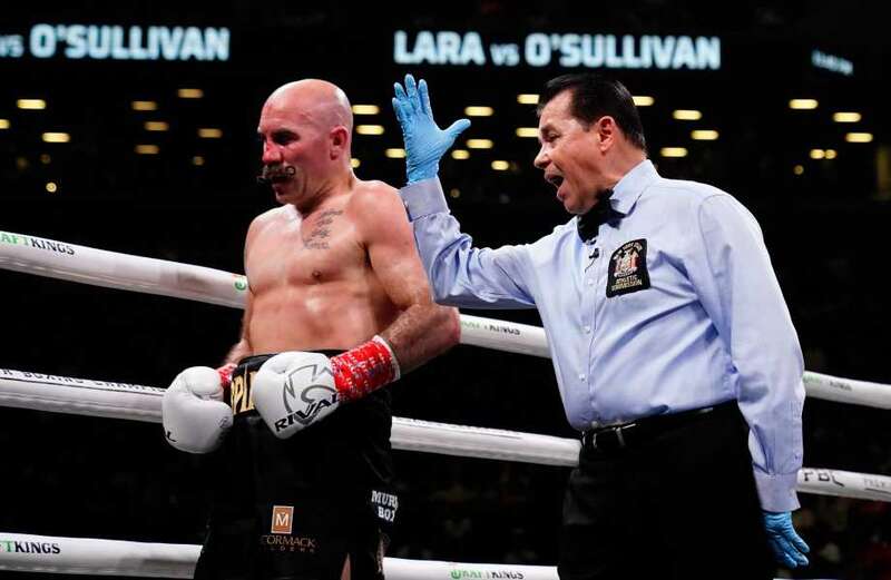 Why do referees wear gloves in boxing?