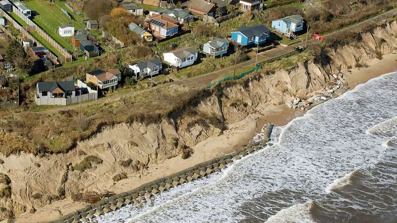 Three homes in Hemsby were demolished amid fears they would crash into the sea (Image: Mike Page / SWNS)