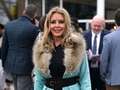 Carol Vorderman shows off curves in belted bodysuit at she returns to Cheltenham