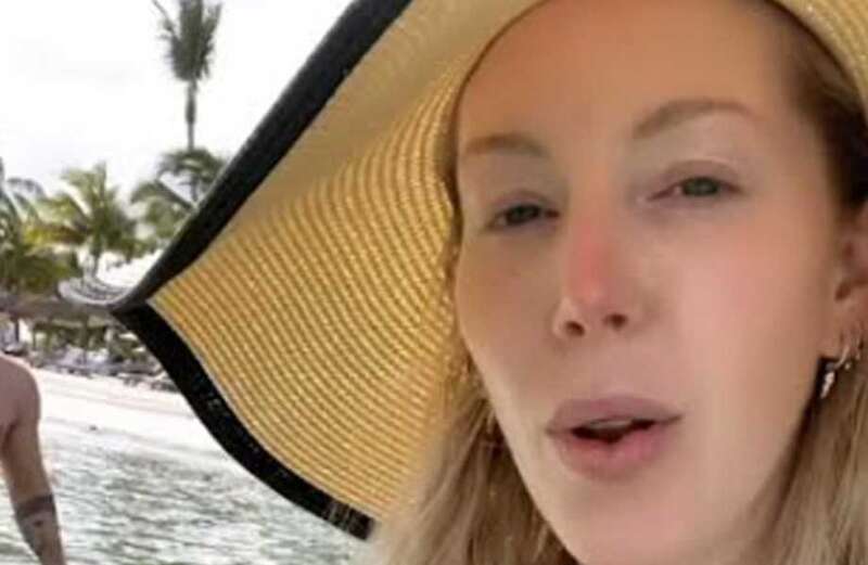 Katherine Ryan goes make-up free and strips to plunging swimsuit