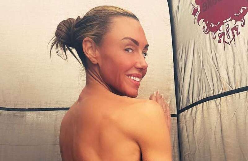 Michelle Heaton strips topless in thong bikini to tan after Dancing On Ice