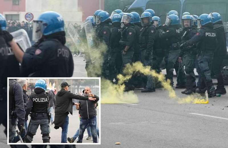 Riot police whack fans with truncheons as flares thrown before Rome derby