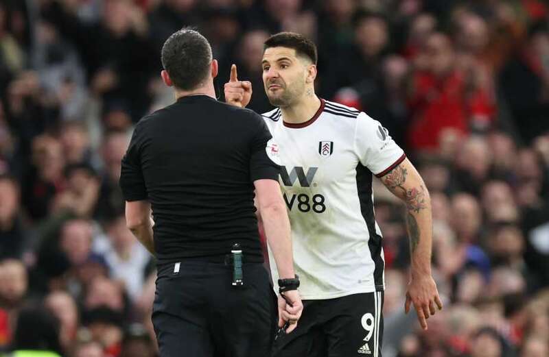 Fulham striker Mitrovic should get TEN-GAME ban for barging ref, says Halsey