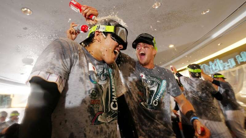 Shohei Ohtani celebrates with Lars Nootbaar in the locker room after Team Japan defeated Team USA, 3-2, in the 2023 World Baseball Classic. (Image: Photo by Daniel Shirey/WBCI/MLB Photos via Getty Images)