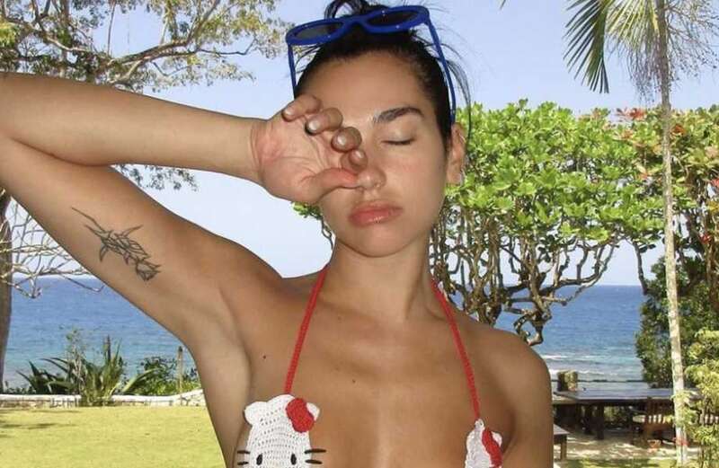 Dua Lipa strips off to barely-there bikini on holiday in Jamaica