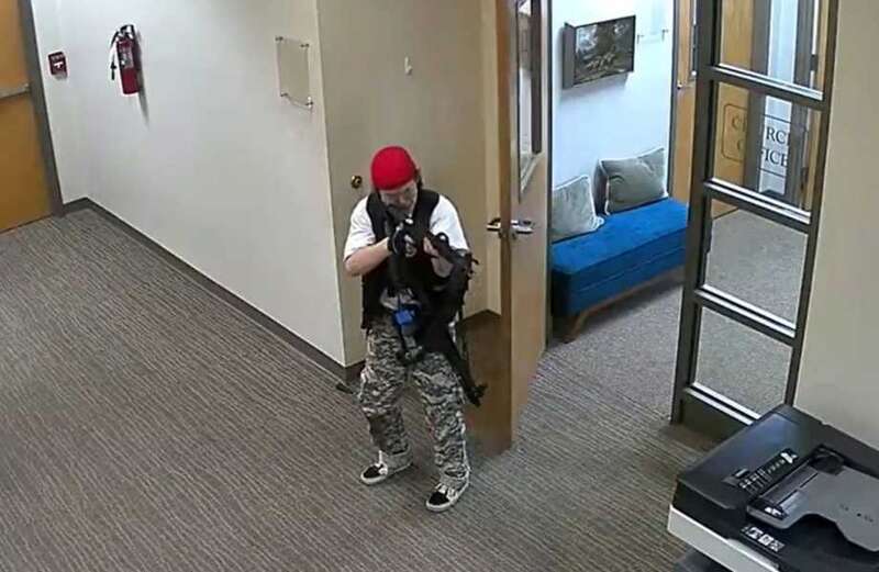 Chilling footage shows shooter stalking school halls before killing six