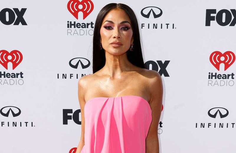 Nicole Scherzinger ditches her underwear in glam pink dress