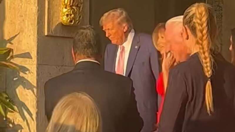 Donald Trump is seen with wife Melania at Mar-a-Lago (Image: @DrGina/Twitter)