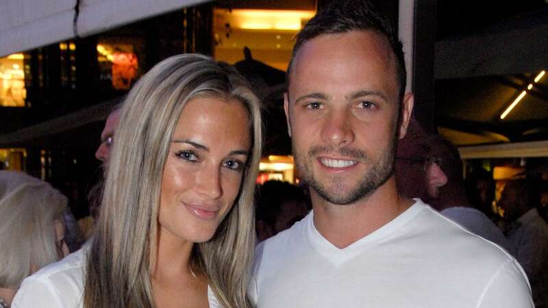 Reeva Steenkamp with her killer Oscar Pistorius (Image: Getty Images)