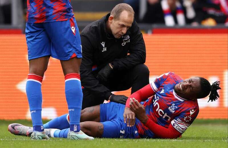 Devastated Wilfried Zaha forced off injured as Roy Hodgson suffers huge blow