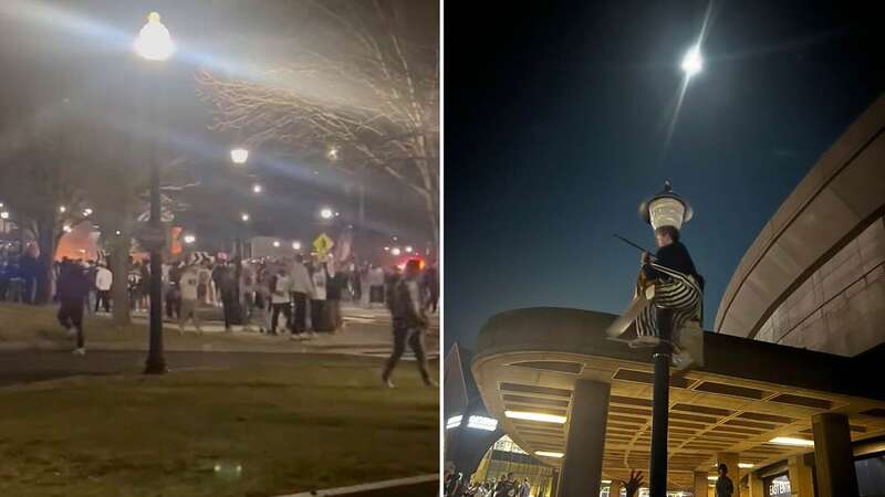 Fans scaled lampposts on campus before taking them down and using one as a battering ram (Image: Twitter)