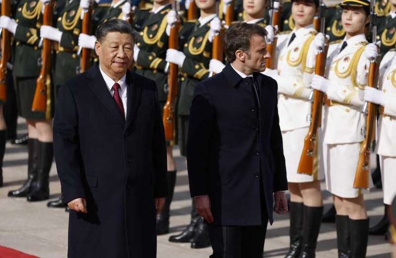 Emmanuel Macron stands with  China's Xi Jinping — amid puppet accusations