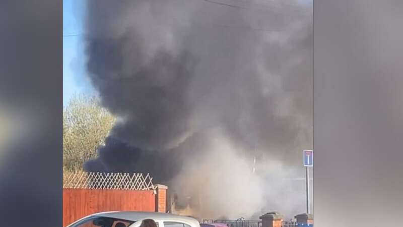 The getaway van was found on fire less than half a mile from the Tesco store (Image: Liverpool Echo)