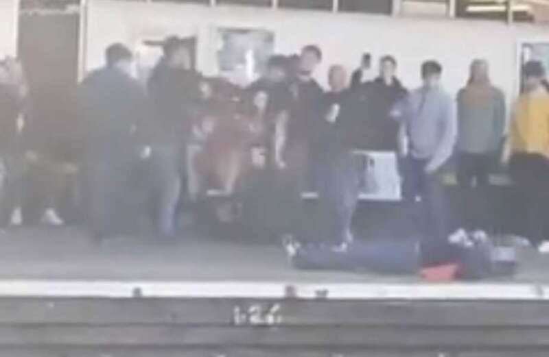 Moment 'Wigan Athletic fan' is knocked out by 'Sheffield United supporter'