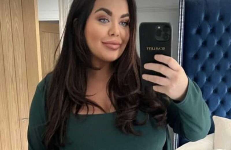 Scarlett Moffatt cradles growing baby bump in swimming costume on holiday