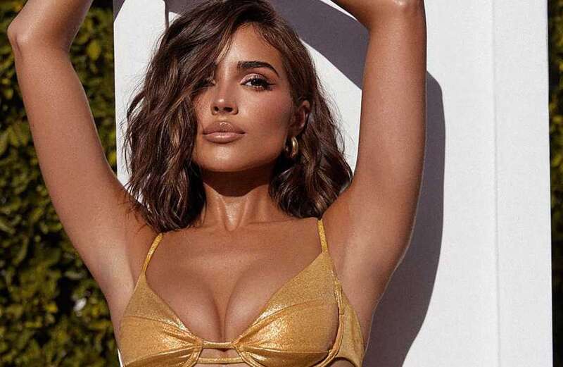 Model Olivia Culpo wows in gold bikini and shows off engagement ring