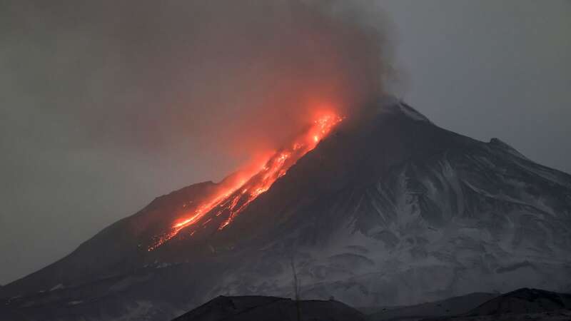 Huge volcanic eruption sends ash cloud 12 miles into sky in apocalyptic scenes