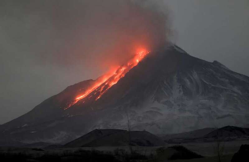 Volcano seen from space as vid shows 12-mile blast sparking flight chaos