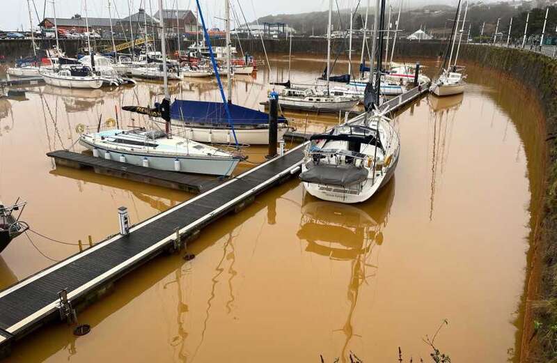 Our seaside town's water has turned ORANGE & no one knows why