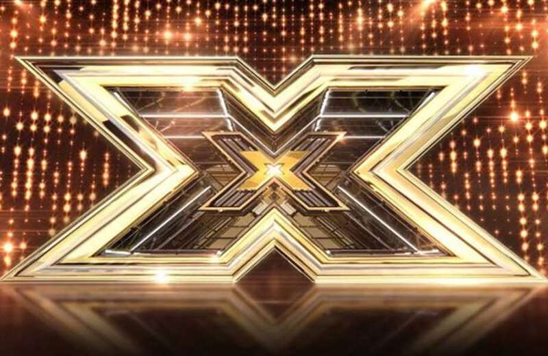 X Factor legend reveals first picture of her baby bump