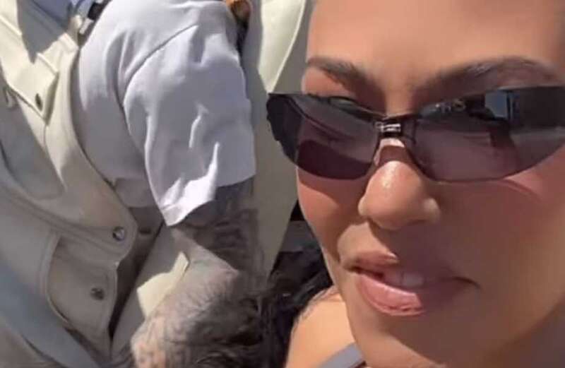 Kourtney Kardashian straddles Travis Barker in steamy on-stage kiss at Coachella