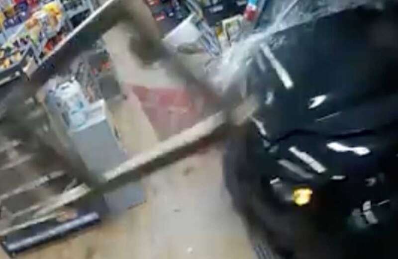 Shocking moment ex-Prem star CRASHES Land Rover through Co-op 'after 10 pints'