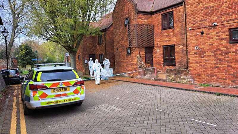 Forensic officers at the car park in Canterbury (Image: KMG / SWNS)