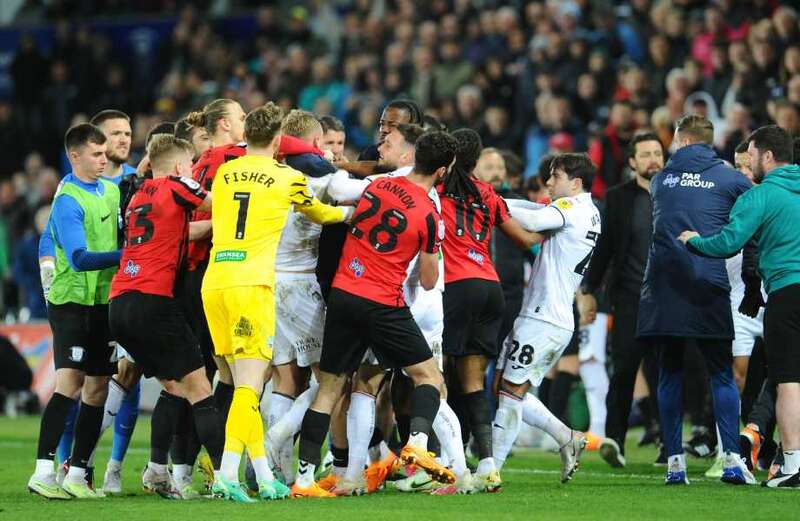 Watch huge brawl erupt in Championship game as ex-Liverpool star is SENT OFF