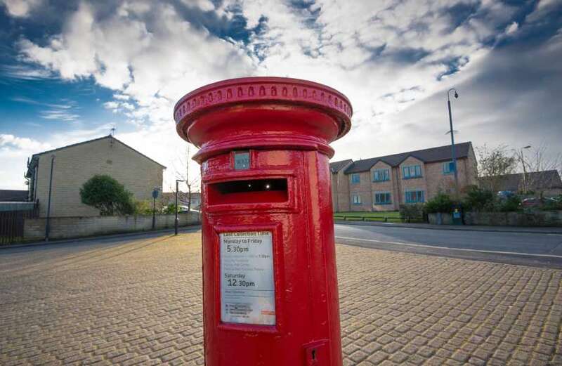 Royal Mail agree wages deal with unions to avoid year of postal strikes