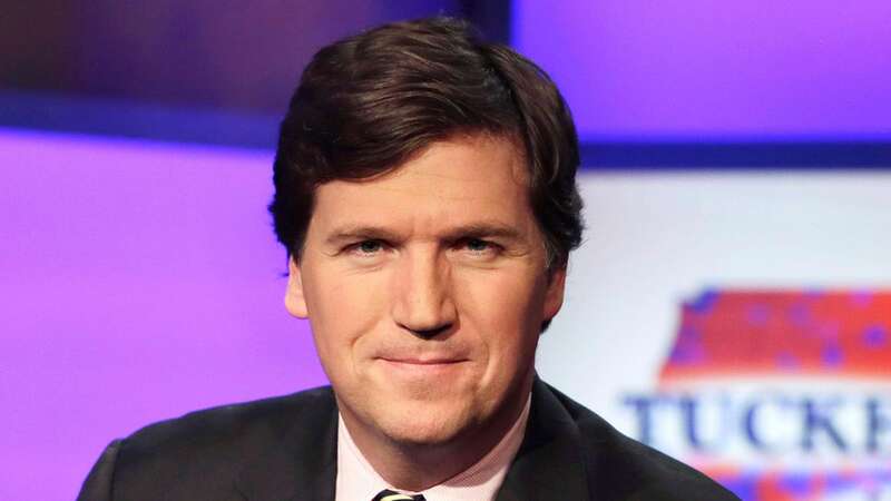 Fox Host Tucker Carlson sent embarrassing private messages criticising Mr Trump (Image: AP)