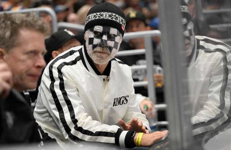 Hollywood star unrecognisable after painting face black & white to watch hockey