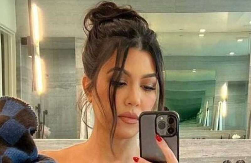 Kourtney goes pantless in just a sweater for cheeky selfie inside mansion