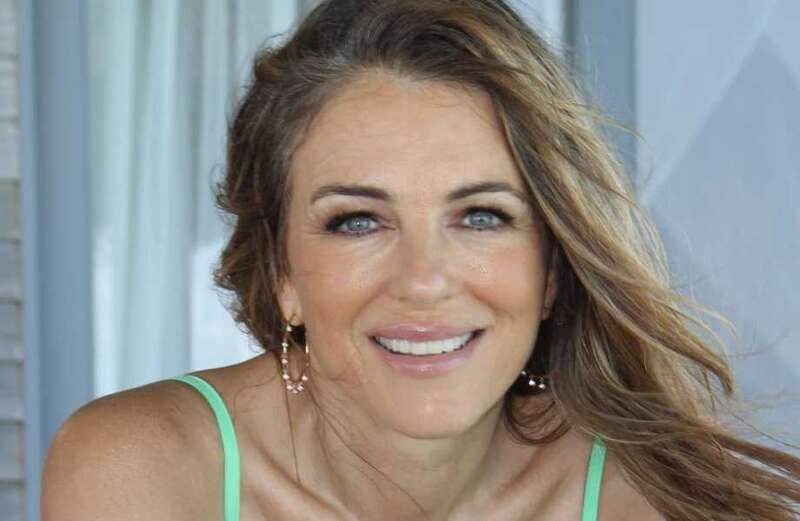 Elizabeth Hurley, 57, looks incredible as she strips off to green bikini