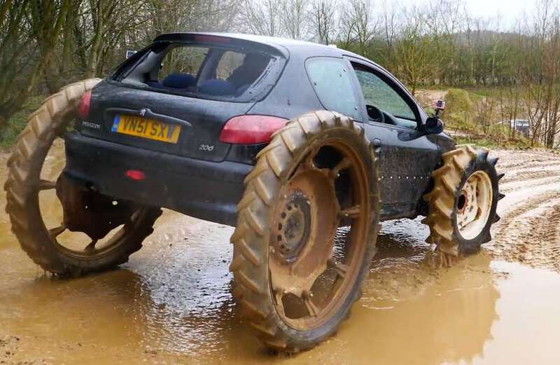 Pals fit tractor wheels to family Peugeot to create 'monster truck'