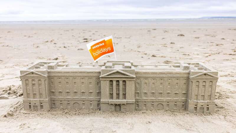 easyJet has unveiled a new Buckingham Palace sandcastle ahead of the Coronation weekend (Image: Cover Images)