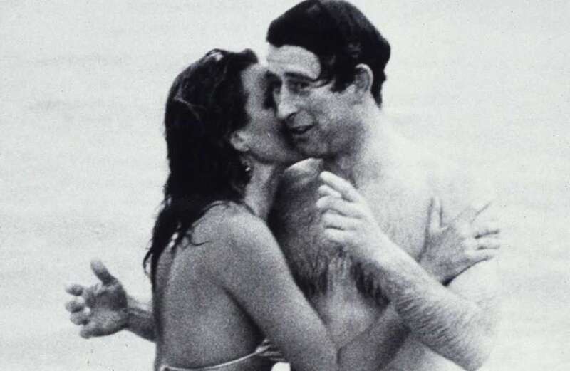 Fun moment King Charles was kissed by scantily clad Playboy model in bikini