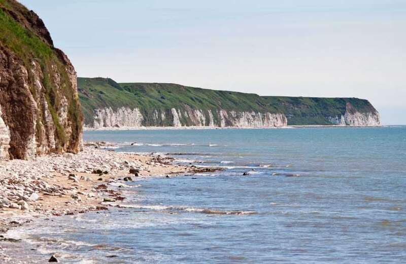 Inside 'overlooked' seaside village a short walk from summer holiday hotspot